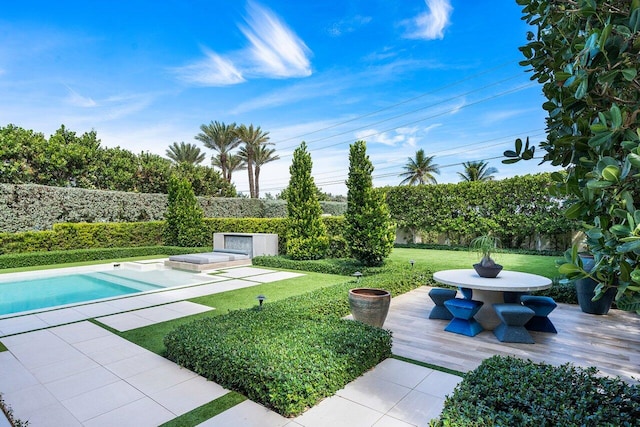 view of yard featuring a fenced in pool