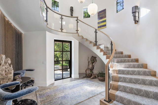 entryway featuring a high ceiling