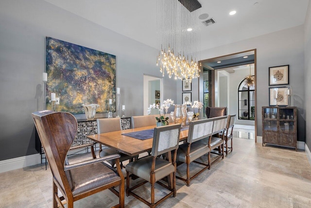 dining room featuring a chandelier