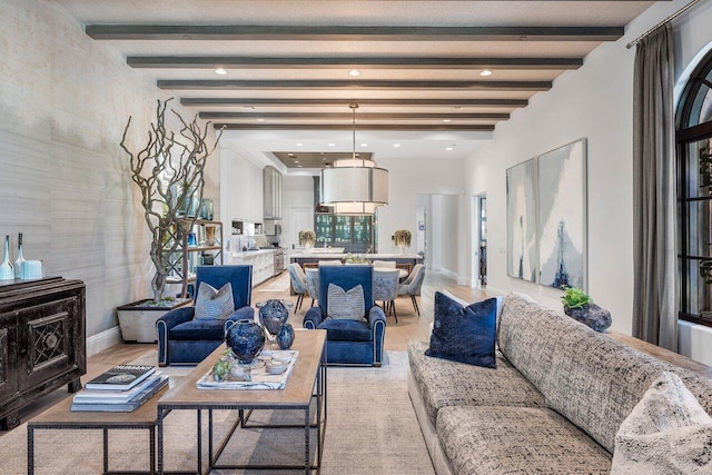 living room with beam ceiling