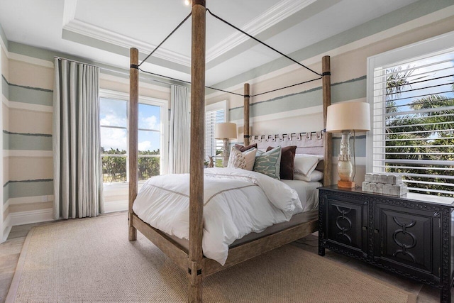 bedroom featuring a raised ceiling