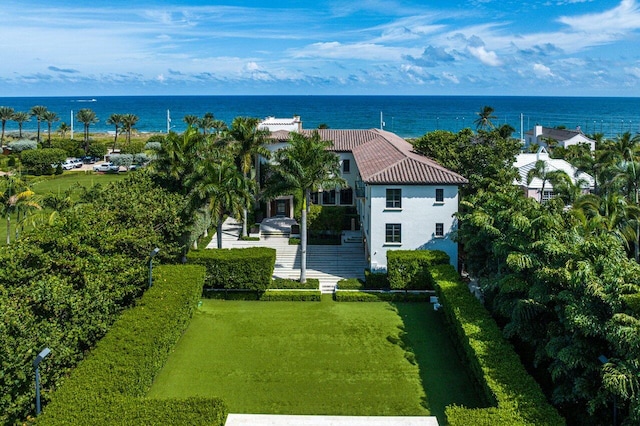 drone / aerial view with a water view