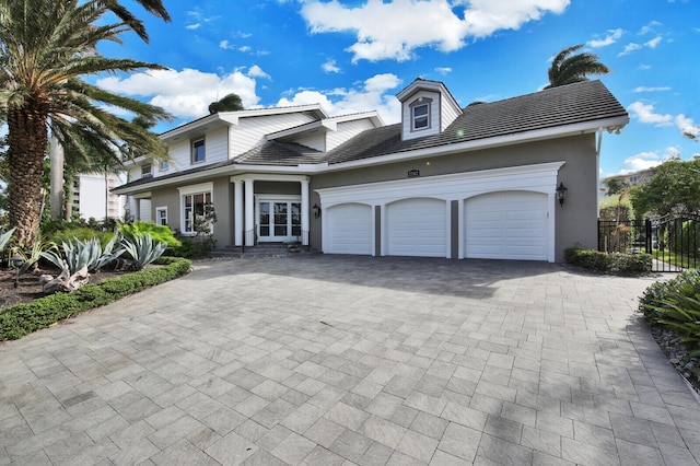 front facade with a garage