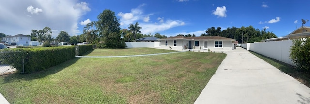 view of front of property with a front lawn