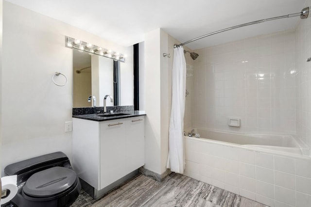 full bathroom featuring shower / bath combination with curtain, toilet, wood-type flooring, and oversized vanity