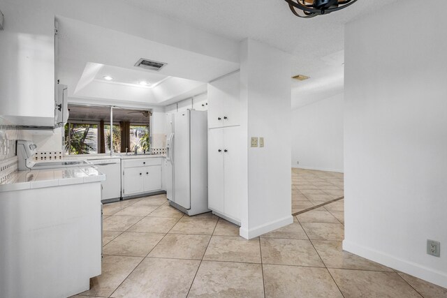 22230 Cameo Dr E, Boca Raton, FL 33433 - interior space featuring recessed lighting, light tile patterned flooring, baseboards, and visible vents