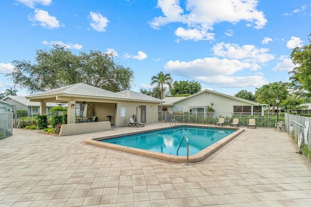 22230 Cameo Dr E, Boca Raton, FL 33433 - community pool with a ceiling fan, a patio area, and fence