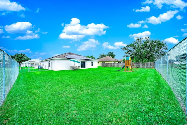 view of yard featuring a playground