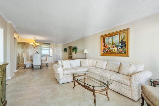 tiled living room featuring crown molding, a textured ceiling, and a notable chandelier