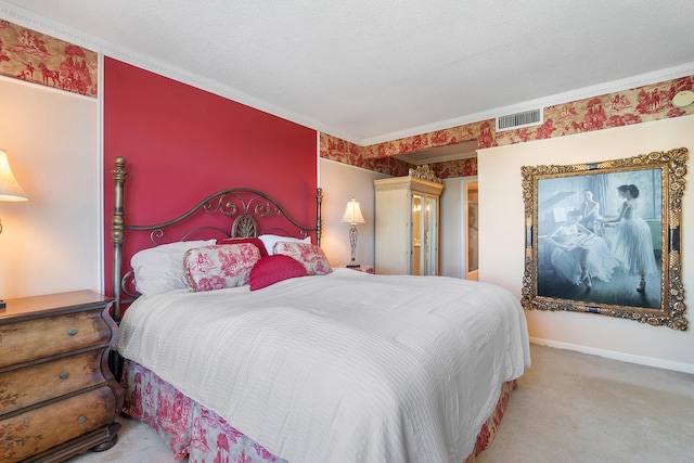 bedroom with light carpet, a textured ceiling, and ornamental molding