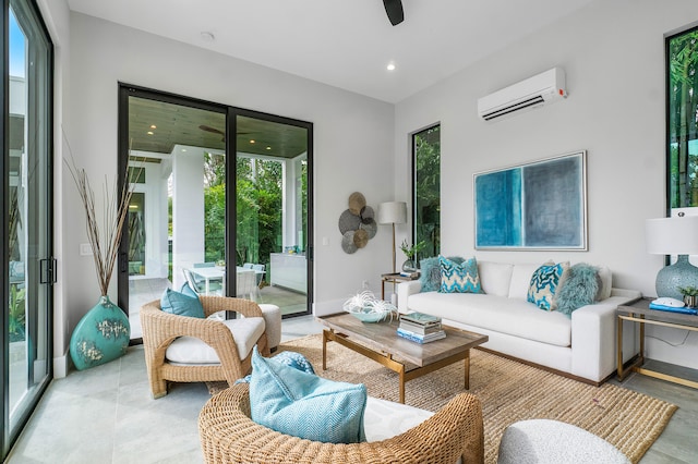 living room featuring a wall mounted air conditioner and ceiling fan