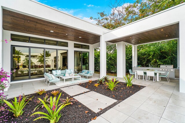 view of terrace featuring a grill and an outdoor hangout area