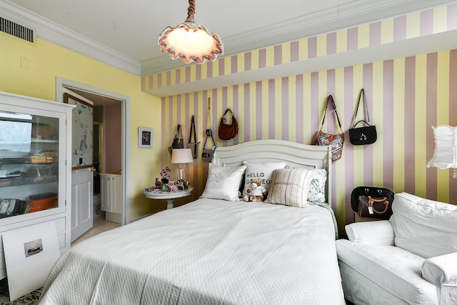 bedroom featuring crown molding