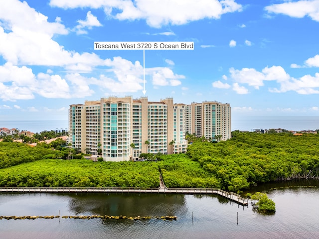 view of building exterior with a water view