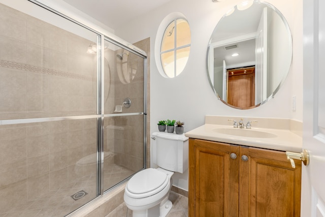 bathroom with walk in shower, toilet, and large vanity