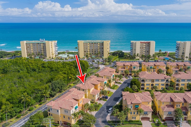 drone / aerial view featuring a water view