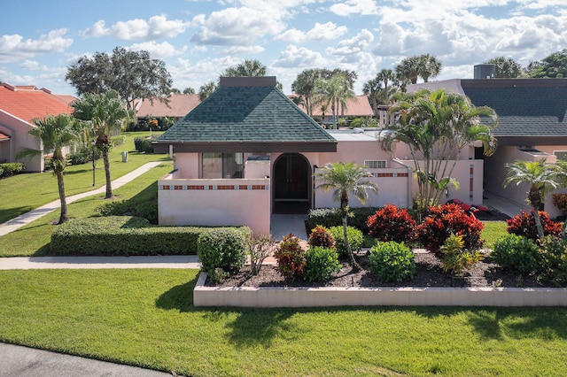 exterior space with a front lawn