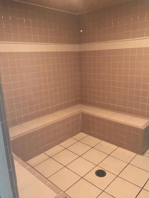 bathroom with tile patterned floors