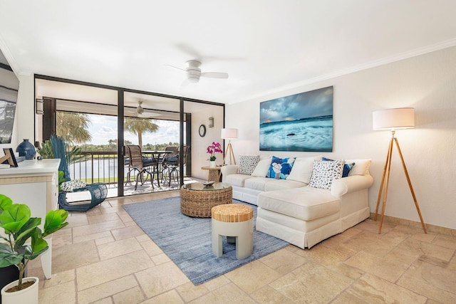 living room with ceiling fan, a water view, and ornamental molding