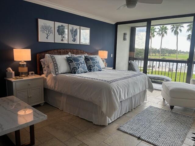 bedroom featuring ceiling fan, expansive windows, access to exterior, and ornamental molding