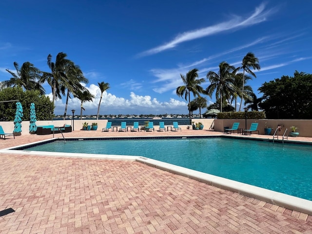 view of swimming pool featuring a patio