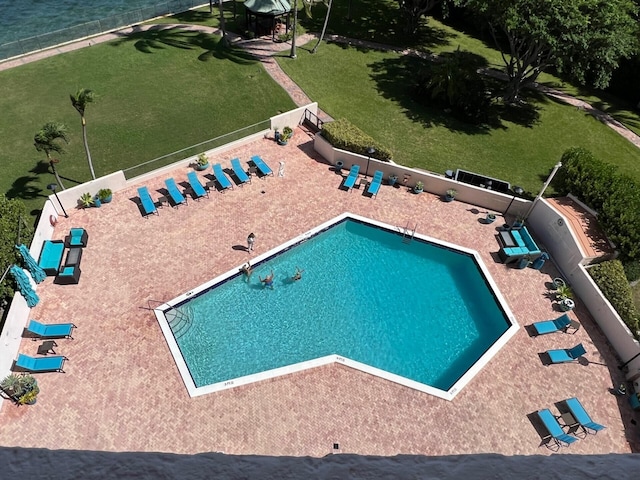 view of pool featuring a playground