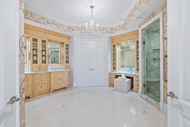 bathroom with an enclosed shower, vanity, a notable chandelier, tile floors, and ornamental molding