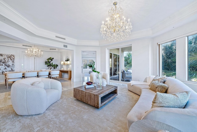 living room featuring a chandelier, plenty of natural light, and ornamental molding