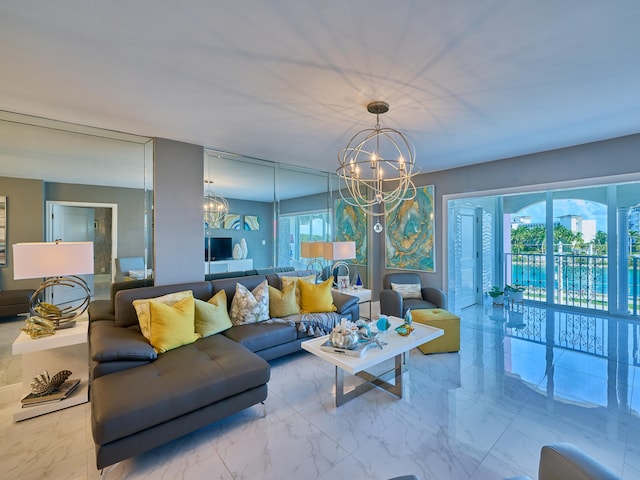 tiled living room featuring a chandelier and plenty of natural light