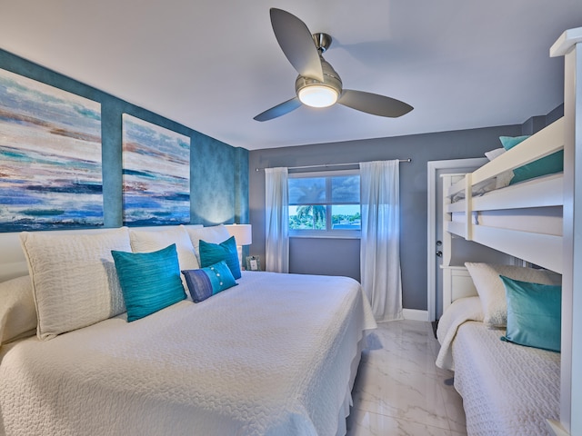 bedroom featuring ceiling fan and tile flooring