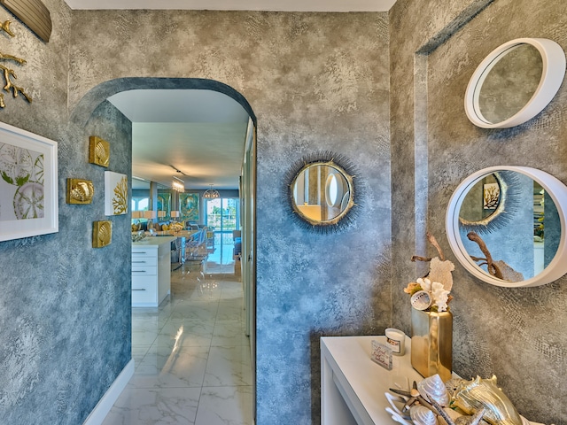 bathroom with vanity and tile floors