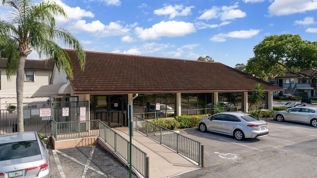 view of front of home featuring uncovered parking