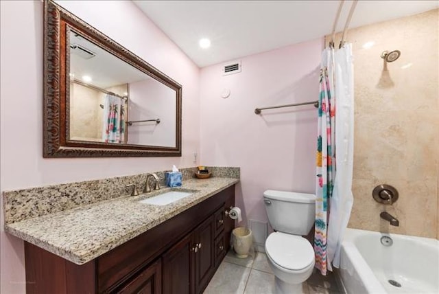 full bathroom with shower / tub combo, vanity, tile floors, and toilet