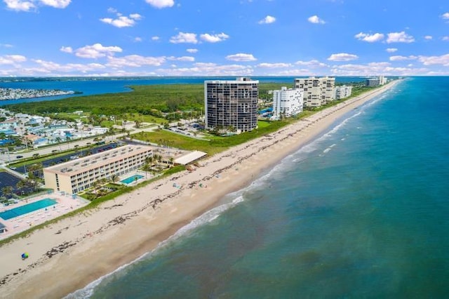 bird's eye view featuring a beach view and a water view