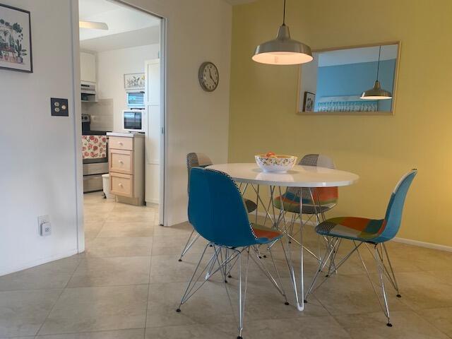 dining room featuring light tile patterned flooring