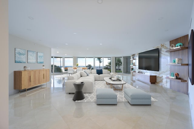 living room with floor to ceiling windows and light tile floors