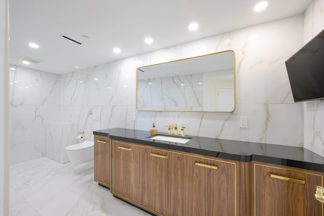 bathroom featuring tile walls, toilet, backsplash, tile flooring, and vanity