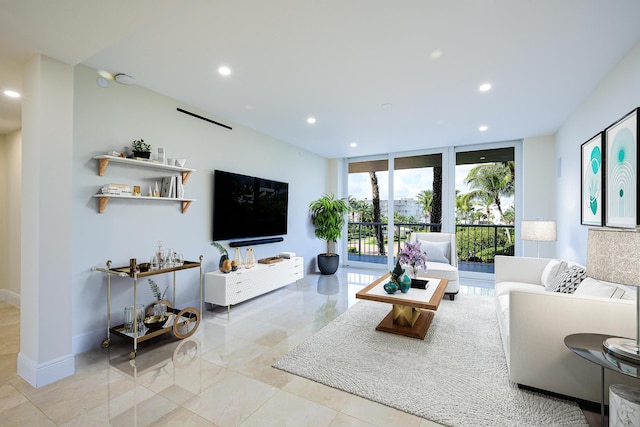 tiled living room featuring expansive windows