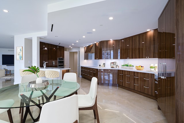 dining space with light tile flooring