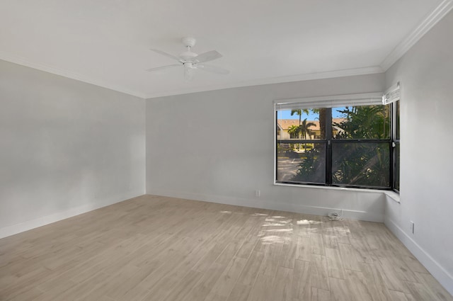 unfurnished room featuring ceiling fan, light hardwood / wood-style flooring, and crown molding