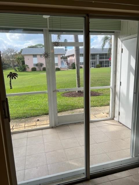 entryway with light tile floors