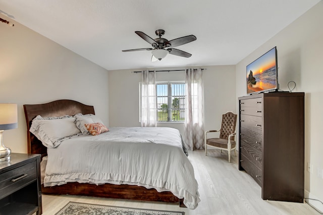 bedroom featuring ceiling fan and light wood-type flooring