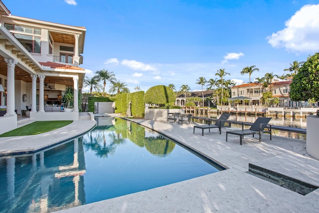 view of swimming pool featuring a patio