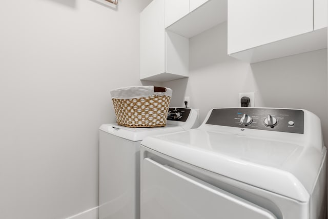 washroom featuring electric dryer hookup and washing machine and dryer