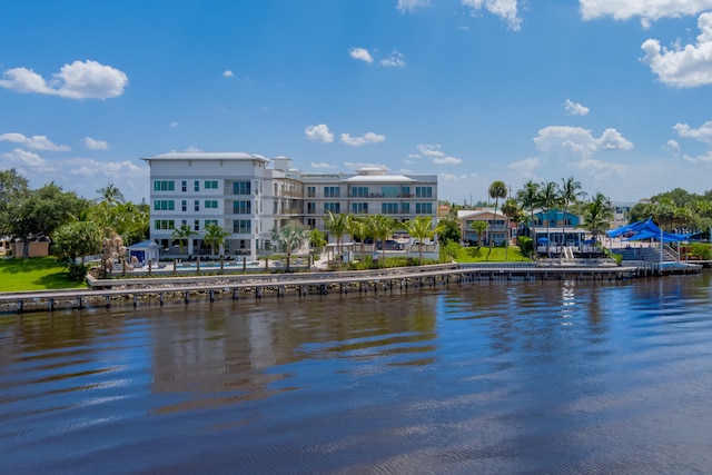 property view of water featuring a boat dock