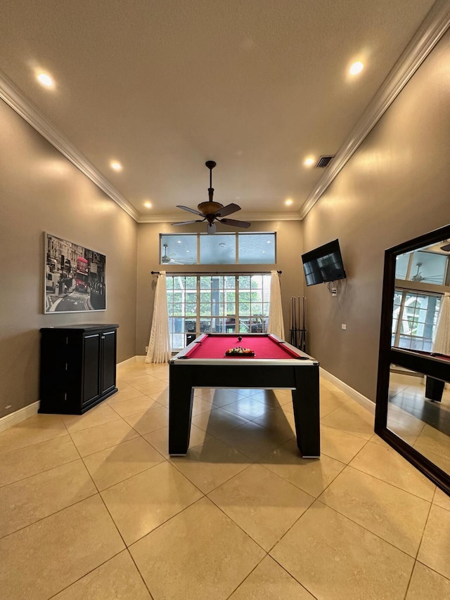 rec room with light tile patterned floors, pool table, ceiling fan, and ornamental molding