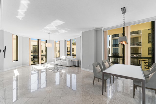 interior space with floor to ceiling windows, a textured ceiling, and crown molding