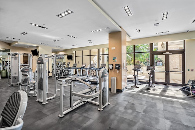 gym featuring french doors