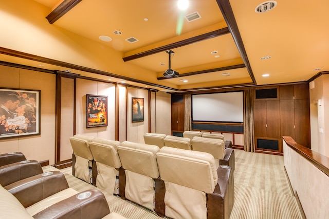 cinema featuring light carpet and beamed ceiling