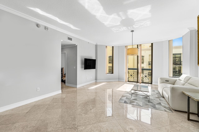 tiled living room featuring a textured ceiling and crown molding